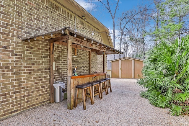 23335 Robinson Pond Dr, New Caney, TX 77357 - view of patio with a storage shed and an outdoor structure