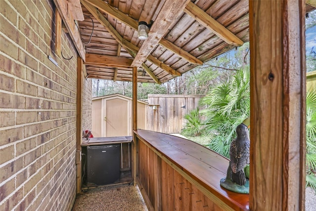 23335 Robinson Pond Dr, New Caney, TX 77357 - view of patio featuring a shed and an outbuilding