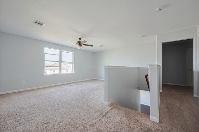 4918 Alder Bend Ln, Richmond, TX 77469 - carpeted spare room with a ceiling fan, baseboards, and a smoke detector