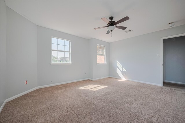 4918 Alder Bend Ln, Richmond, TX 77469 - unfurnished room featuring light colored carpet, baseboards, and a ceiling fan