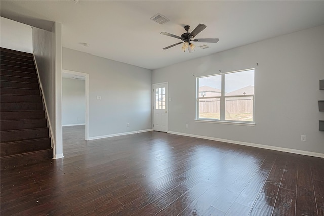 4918 Alder Bend Ln, Richmond, TX 77469 - unfurnished living room featuring a ceiling fan, stairway, baseboards, and dark wood-style floors