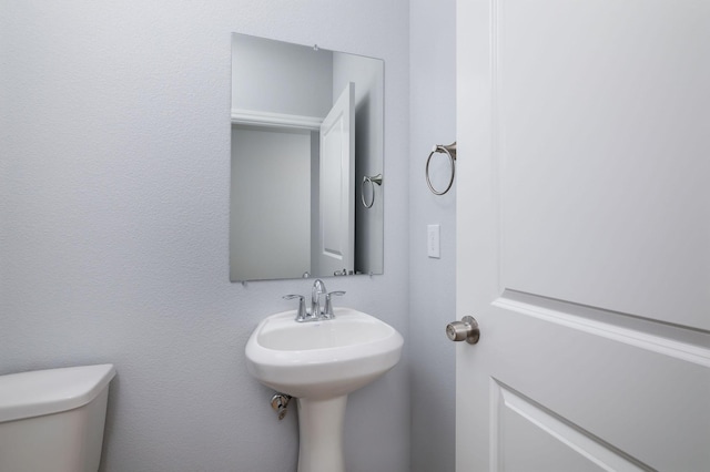 18832 Elegance Ave, Spring, TX 77379 - half bath featuring toilet and a sink