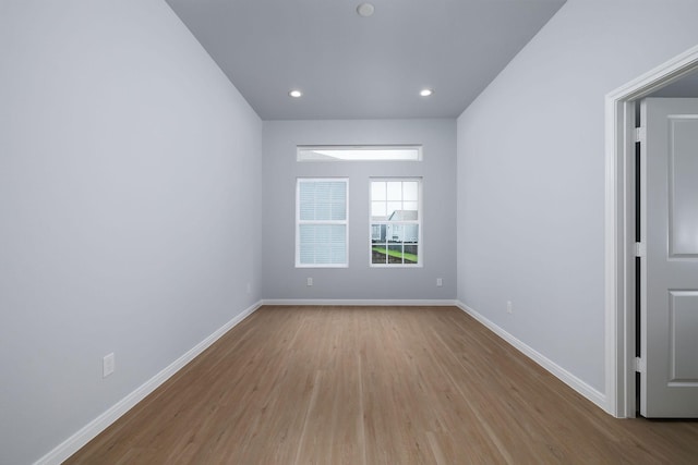 18832 Elegance Ave, Spring, TX 77379 - unfurnished room featuring wood finished floors, baseboards, and recessed lighting