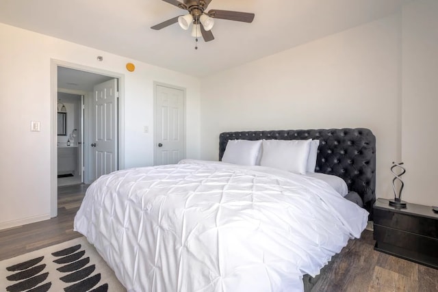 3525 Sage Rd Unit 1105, Houston, TX 77056 - bedroom with wood finished floors, a ceiling fan, and baseboards