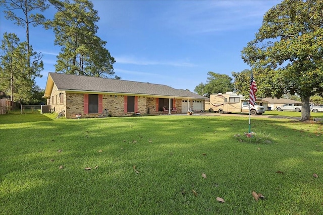 7760 Laurie Ln, Lumberton, TX 77657 - single story home with an attached garage and brick siding