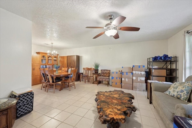 7760 Laurie Ln, Lumberton, TX 77657 - living area featuring a textured ceiling, light tile patterned floors, a chandelier, and a ceiling fan