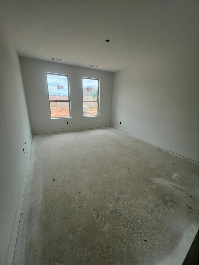 2213 Sonder Shore Dr, Katy, TX 77493 - spare room with unfinished concrete flooring