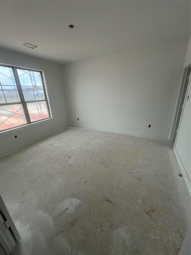 2213 Sonder Shore Dr, Katy, TX 77493 - spare room featuring unfinished concrete floors