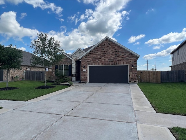 7426 Water Glen Ln, Manvel, TX 77578 - view of front of property with a garage, concrete driveway, and brick siding
