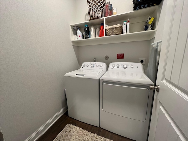 7426 Water Glen Ln, Manvel, TX 77578 - laundry room with washing machine and clothes dryer, dark wood-style floors, and baseboards