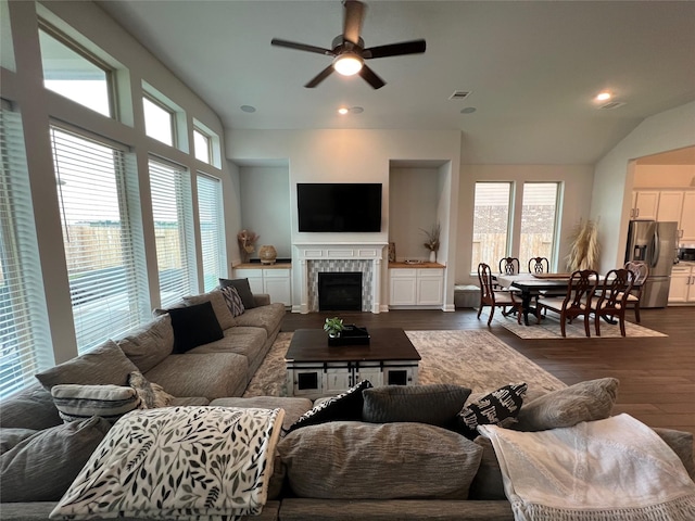 7426 Water Glen Ln, Manvel, TX 77578 - living room featuring ceiling fan, a fireplace, dark wood-style floors, and recessed lighting