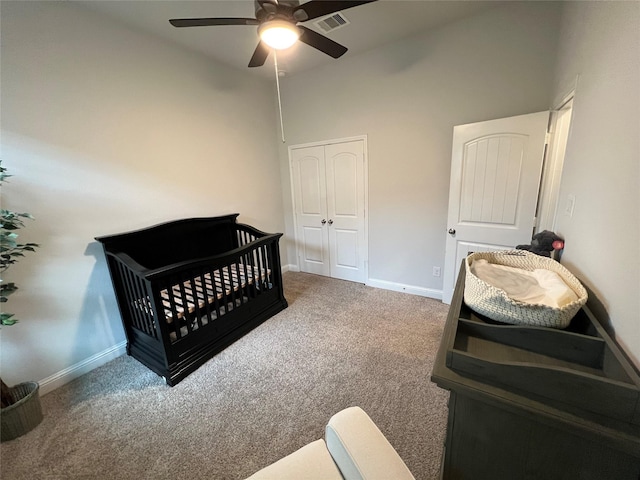 7426 Water Glen Ln, Manvel, TX 77578 - bedroom with carpet, baseboards, a ceiling fan, and a closet