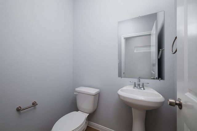 18834 Elegance Ave, Spring, TX 77379 - half bathroom with toilet and a sink