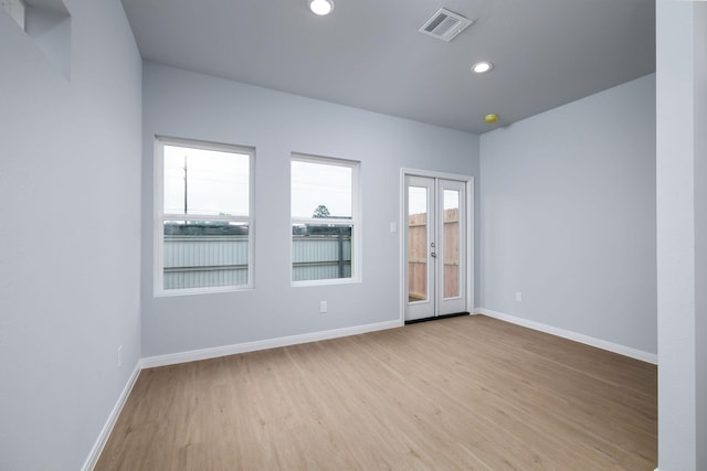 18834 Elegance Ave, Spring, TX 77379 - empty room featuring light wood-style flooring, baseboards, and recessed lighting