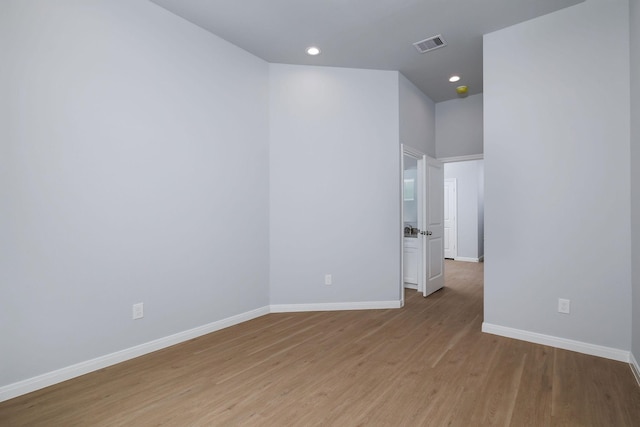 18834 Elegance Ave, Spring, TX 77379 - spare room featuring baseboards, light wood-type flooring, and recessed lighting