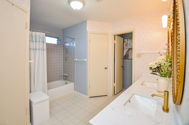full bath featuring tile patterned flooring, double vanity, shower / bath combo with shower curtain, wallpapered walls, and baseboards