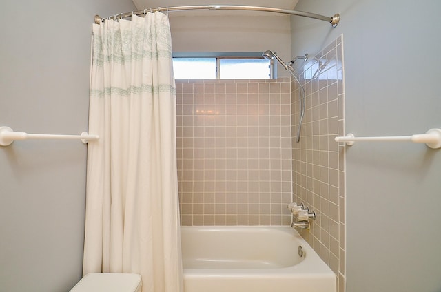 bathroom featuring shower / tub combo