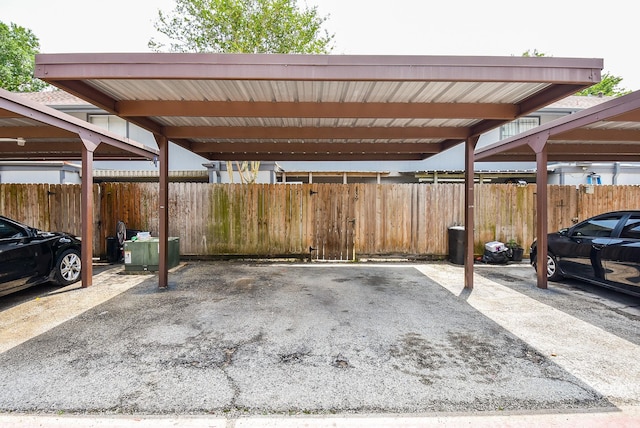 5809 Village Forest Ct, Houston, TX 77092 - covered parking lot featuring fence