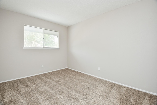 5809 Village Forest Ct, Houston, TX 77092 - empty room featuring carpet floors and baseboards