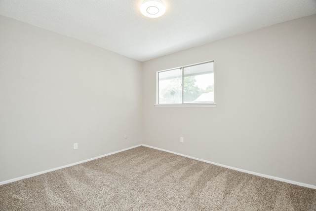 5809 Village Forest Ct, Houston, TX 77092 - carpeted spare room featuring baseboards