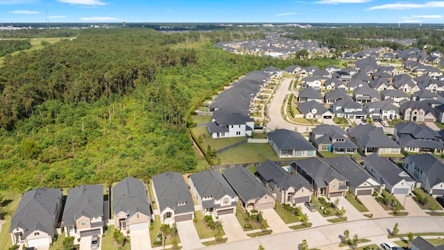 17786 Tree Of Heaven, Conroe, TX 77385 - view of property location with nearby suburban area and a heavily wooded area