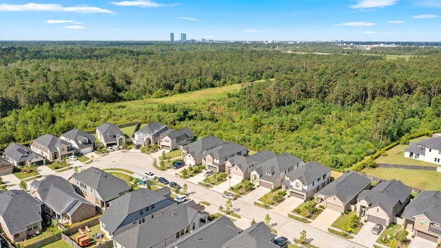 17786 Tree Of Heaven, Conroe, TX 77385 - aerial view of residential area featuring a forest