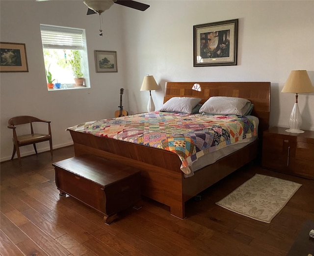 316 S Main St, Seadrift, TX 77983 - bedroom with wood finished floors, baseboards, and ceiling fan