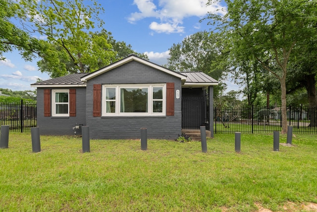 507 Silverdale Dr, Conroe, TX 77301 - view of front of home featuring a standing seam roof and metal roof