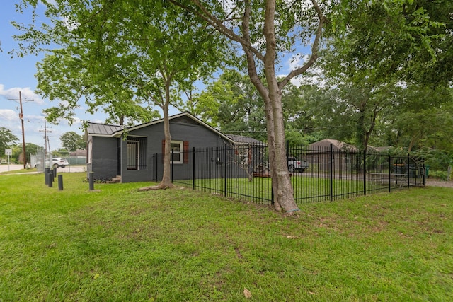 507 Silverdale Dr, Conroe, TX 77301 - back of property with a standing seam roof and metal roof