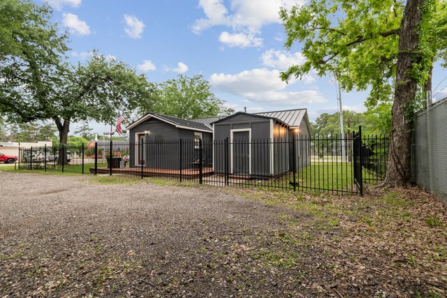507 Silverdale Dr, Conroe, TX 77301 - view of outbuilding featuring fence