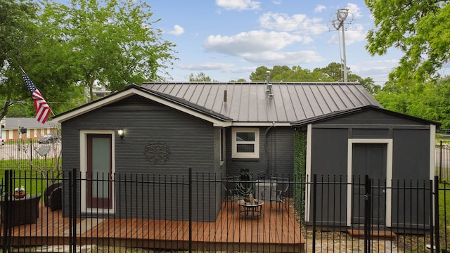 507 Silverdale Dr, Conroe, TX 77301 - view of front of house with fence and metal roof