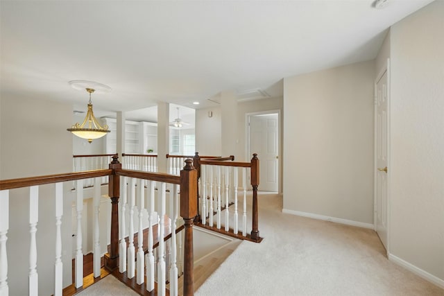 4027 Austin Meadow Dr, Sugar Land, TX 77479 - hallway with an upstairs landing, carpet, and baseboards