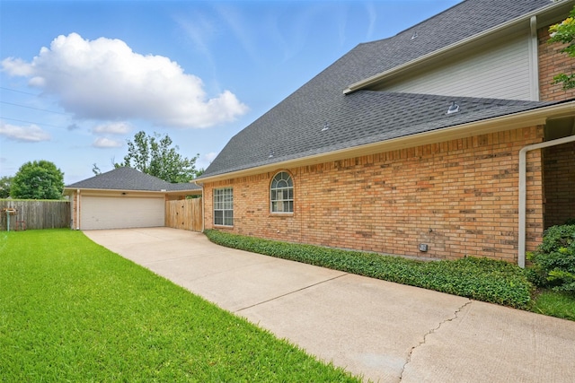 4027 Austin Meadow Dr, Sugar Land, TX 77479 - view of side of property featuring brick siding and roof with shingles