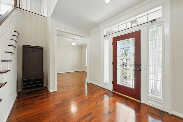4027 Austin Meadow Dr, Sugar Land, TX 77479 - foyer entrance with wood-type flooring, a ceiling fan, and baseboards