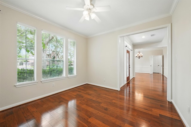 4027 Austin Meadow Dr, Sugar Land, TX 77479 - empty room with a chandelier, hardwood / wood-style flooring, baseboards, ornamental molding, and ceiling fan