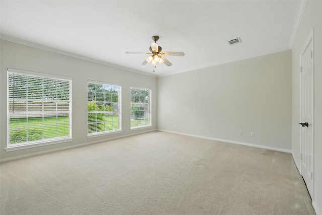4027 Austin Meadow Dr, Sugar Land, TX 77479 - spare room featuring crown molding, light carpet, ceiling fan, and baseboards