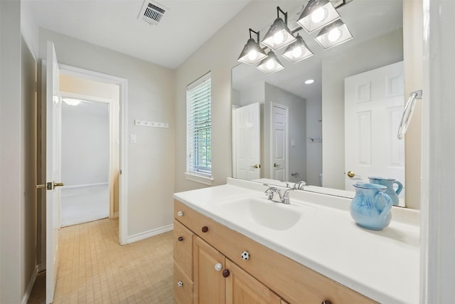 4027 Austin Meadow Dr, Sugar Land, TX 77479 - bathroom with tile patterned flooring, baseboards, and vanity