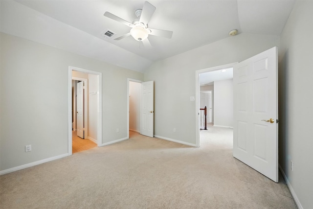 4027 Austin Meadow Dr, Sugar Land, TX 77479 - unfurnished bedroom with light carpet, lofted ceiling, baseboards, ceiling fan, and ensuite bathroom