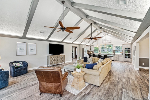 20316 County Road 510b, Brazoria, TX 77422 - living room with light wood finished floors, baseboards, and ceiling fan