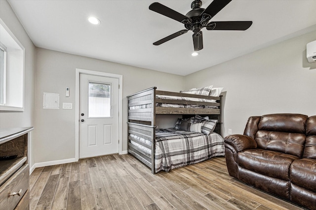 20316 County Road 510b, Brazoria, TX 77422 - bedroom with wood finished floors, recessed lighting, a ceiling fan, and baseboards