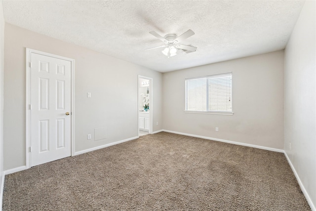 11405 Starlight Bay St, Pearland, TX 77584 - carpeted empty room with ceiling fan, a textured ceiling, and baseboards