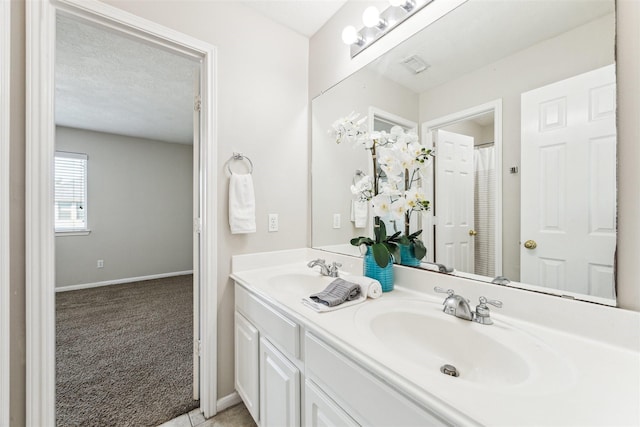 11405 Starlight Bay St, Pearland, TX 77584 - full bath featuring baseboards and double vanity