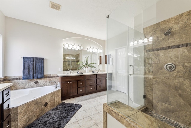 11405 Starlight Bay St, Pearland, TX 77584 - full bathroom with a shower stall, a tub with jets, double vanity, and tile patterned floors