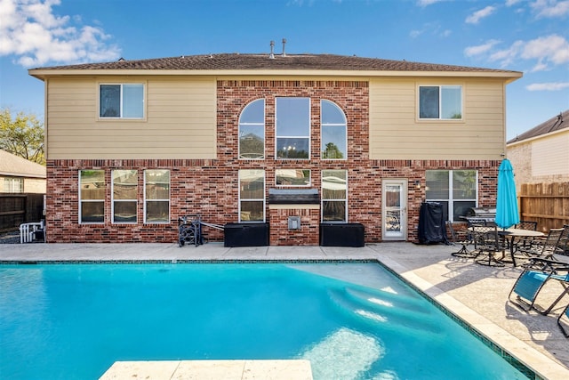 11405 Starlight Bay St, Pearland, TX 77584 - swimming pool with a patio and fence