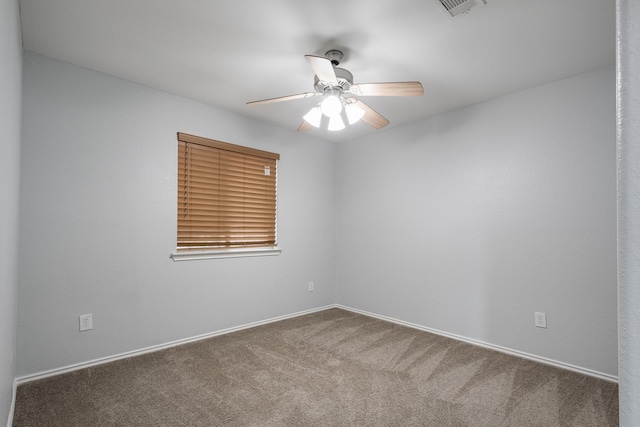 4523 Bridgevillage Dr, Spring, TX 77373 - empty room featuring a ceiling fan, carpet floors, and baseboards