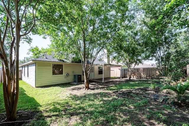 4523 Bridgevillage Dr, Spring, TX 77373 - view of yard with cooling unit and a patio