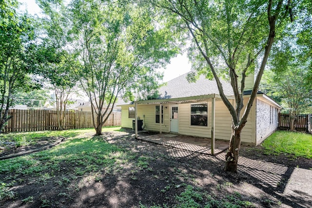4523 Bridgevillage Dr, Spring, TX 77373 - fenced backyard featuring central AC and a patio area