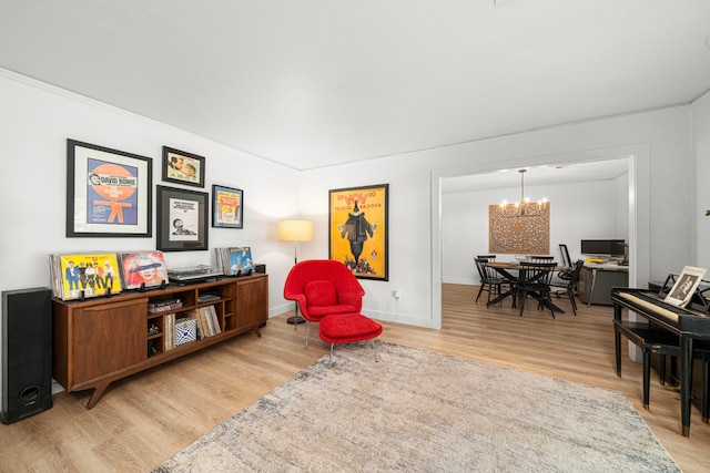13919 Kimberley Ln, Houston, TX 77079 - living area featuring wood finished floors, a chandelier, and baseboards