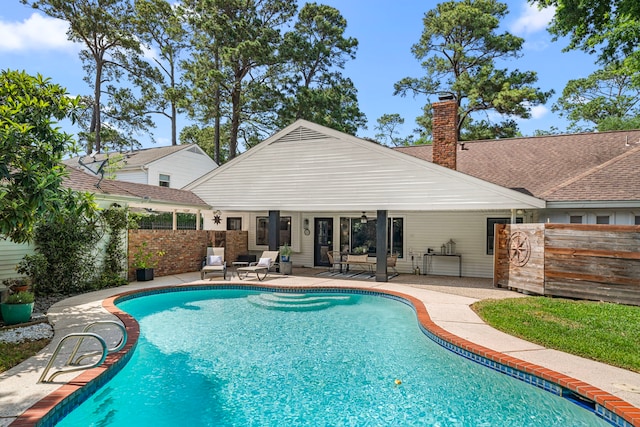 13919 Kimberley Ln, Houston, TX 77079 - view of swimming pool with a patio area, fence, and ceiling fan