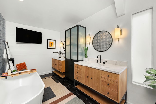 13919 Kimberley Ln, Houston, TX 77079 - full bath with two vanities and a soaking tub
